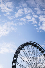 Fototapeta na wymiar Scenic view of a ferris wheel against sky in Montreal