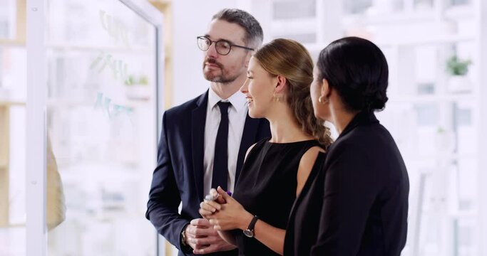 Business people, ideas and brainstorming with team on glass for schedule, mindmap and planning goals, agenda and timeline. Collaboration, group and writing notes for strategy, training and target