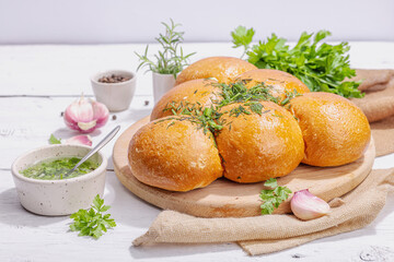 Aromatic garlic buns. Fresh baked goods, a traditional gluten-free soup snack. Parsley, spices