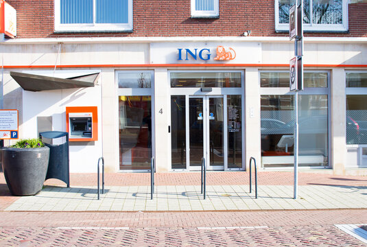 Elst, Netherlands - March 7, 2020: Dutch ING bank branch, with orange ING logo