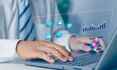 Analyst working with Business Analytics and Data Management System on computer, make a report with KPI and metrics connected to database. Corporate strategy for finance, 