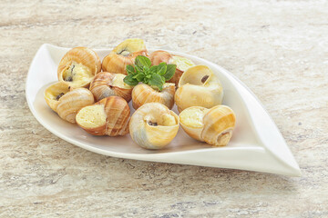 Delicous baked snail with butter - Escargot