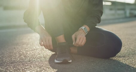 City, runner or hands tie shoes to start workout, sports exercise or fitness training for running. Closeup, footwear or healthy girl with commitment or motivation ready for exercising on urban road