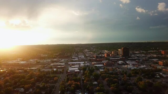 Aerial Panning Shot Of Buildings In City Against Sky At Sunset - Billings, Montana
