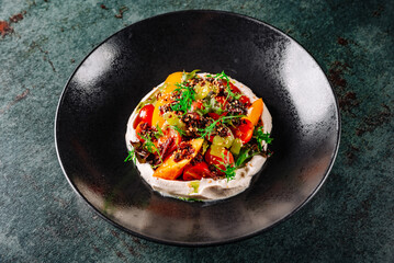 Sun dried tomatoes Salad with fresh vegetables mix and cheese on plate