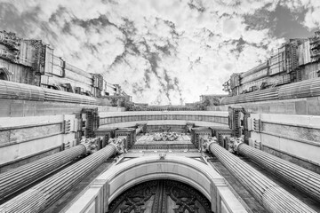 Wide angle upwards view of the facade of the Cathedral of Malaga; Malaga Cathedral in Malaga, Andalusia, Spain in black and white