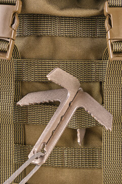 hook cat on tactical military green olive backpack with molle system