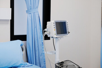 Medical equipment and beds in patient rooms.
