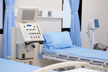 Medical equipment and beds in patient rooms.