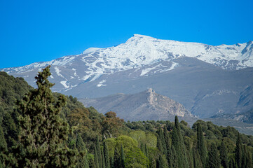Panoramic view of snowed mountains in Granada, Spain on April 5, 2023