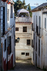 Fototapeta na wymiar Walking in historic center in Granada, Spain on April 5, 2023
