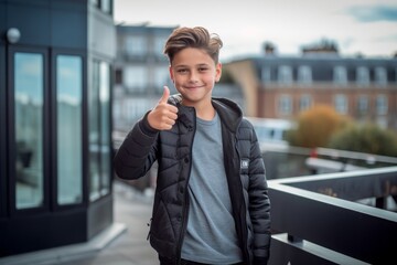 Fototapeta premium Medium shot portrait photography of a glad boy in his 30s showing ok gesture against a rooftop terrace background. With generative AI technology