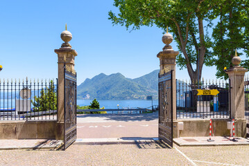 Verbania, Italy. View from the entrance gate of the botanical garden of Villa Taranto on Lake...