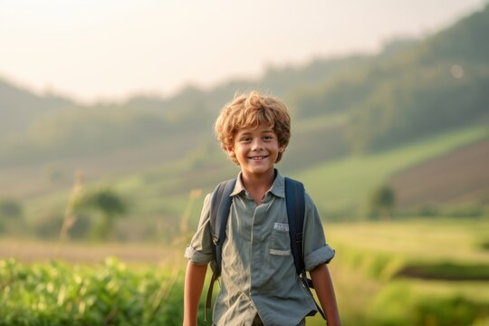 Medium shot portrait photography of a grinning kid male walking against a picturesque countryside background. With generative AI technology