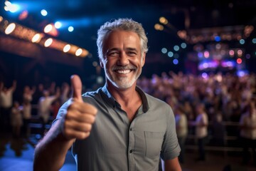 Lifestyle portrait photography of a grinning mature man showing ok gesture against a lively concert venue background. With generative AI technology