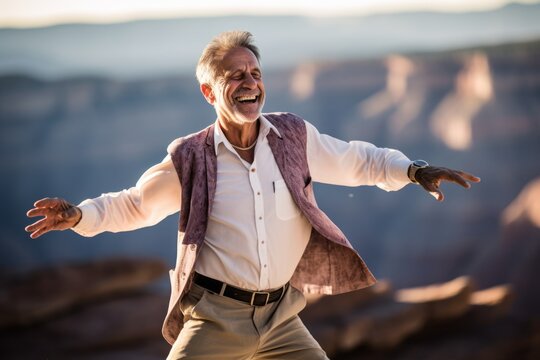 Medium shot portrait photography of a grinning mature man dancing against a scenic canyon background. With generative AI technology