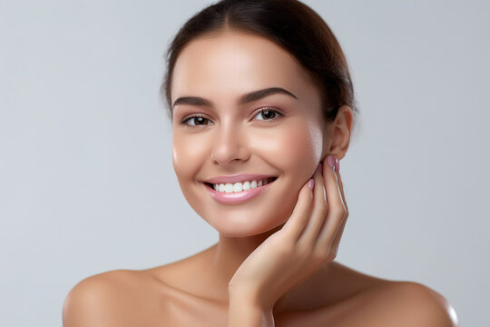 Beautiful young woman touching her clean face with fresh healthy skin isolated on white background. Generative ai.