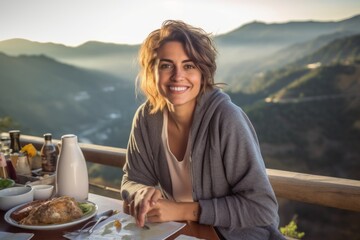 Medium shot portrait photography of a satisfied girl in her 30s having breakfast against a scenic mountain overlook background. With generative AI technology