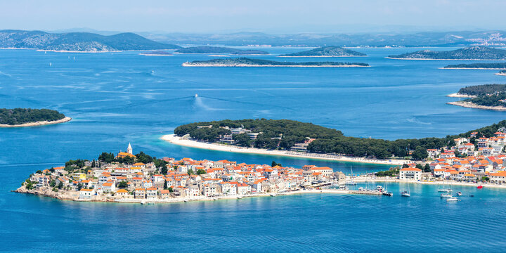 Primosten town on a peninsula vacation in the Mediterranean Sea panorama in Primo&scaron;ten, Croatia