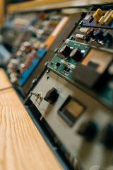old displays of professional analog volume meters in a recording studio measuring and showing...