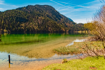 Alpine summer view with reflections at Lake Hintersteiner See, Scheffau, Mount Wilder Kaiser, Tyrol, Austria