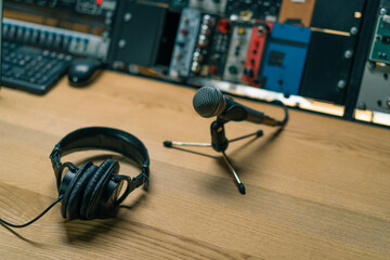 professional recording studio equalizer microphone headphones close-up for sound engineer recording...