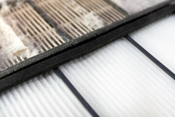 clean and dirty used air filter in cleaning robot of housekeeping cleaner vacuum machine technology for clean dirty dust pollution service in house on white background