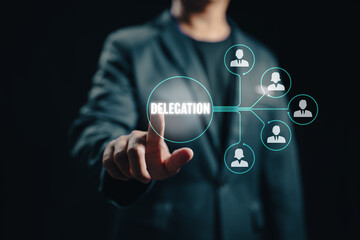 The manager delegates work to another person in the team, exemplifying the managerial concept of delegation and the effective distribution of tasks.