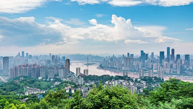 High angle time-lapse shot of city buildings skyline and river in Chongqing