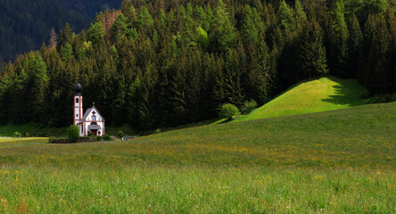 Fototapeta premium Summer image of the Church of San Giovanni in Ranui, Santa Maddalena, Puez Odle Natural Park, Italy, Europe