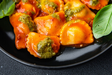ravioli pesto sauce tomato sauce healthy meal food snack on the table copy space food background rustic top view