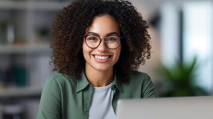 Close up portrait of young beautiful woman smiling while working with laptop in office.Created with Generative AI technology.