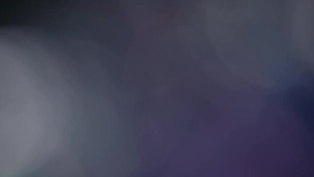 Multicolored light leaks 4k footage on black background. Lens studio flare leak burst overlays. Natural lighting lamp rays bokeh effect. For compositing over your footage, stylizing video, transitions