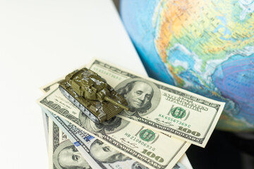 Miniature toy tank on the map of Belarus Lithuania map.