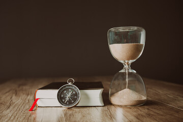 Book, compass and hourglass © Daniel