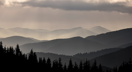 beautiful somewhat dark cloudy landscape of mountains