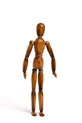 Standing wooden mannequin white background.