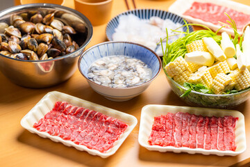 Homemade hotpot with different seafood at home