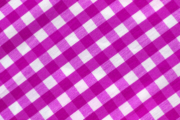 The texture of linen fabric in a large cell of green and white. Scottish tailoring material