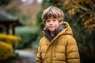 Environmental portrait photography of a glad mature boy wearing a cozy winter coat against a tranquil japanese garden background. With generative AI technology