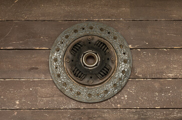 Disassembled clutch disc of a car in a car service repair shop