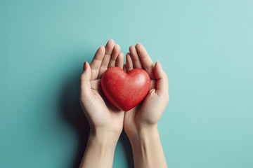 Woman hands holding red heart on pastel isolated background.Top view.Copy and text space.Created with generative ai