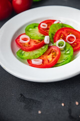 fresh tomato salad red and green fruit vegetable dish healthy meal food snack on the table copy space food background rustic top view 