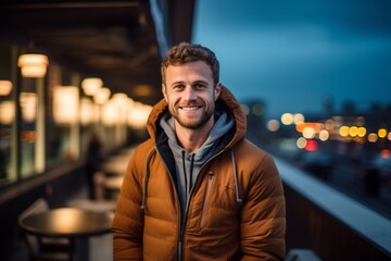 Fototapeta premium Lifestyle portrait photography of a glad mature boy wearing a cozy zip-up hoodie against a lively rooftop bar background. With generative AI technology