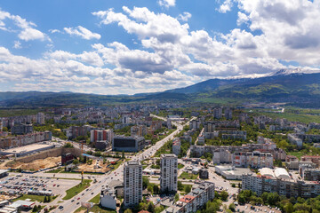 Obraz premium Aerial view from a drone of a city next to the mountain, Sofia Bulgaria