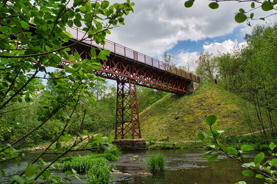 Railway bridge over the river
The Uncovered Bridge (Den Genfundne Bro)