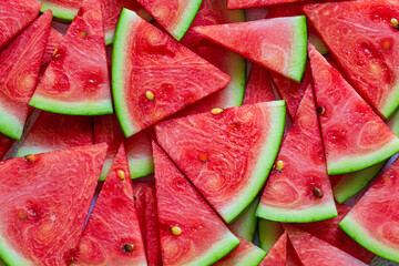 Macro sliced watermelon,Red watermelon triangular piece on white blackground