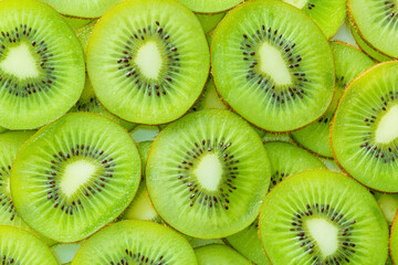 macro kiwi background,Kiwi Macro,Fresh Kiwi fruit sliced use for background,slice of kiwi fruit on a full frame. horizontal format