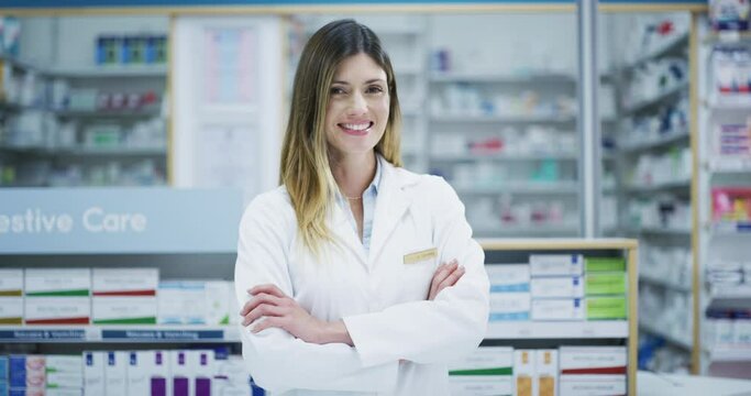 Happy woman, pharmacist and arms crossed for professional healthcare or pharmaceutical advice at pharmacy. Portrait of confident female medical expert with smile for health and wellness at the clinic