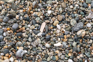 Close-up of small pebbles on the beach